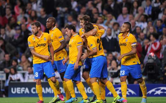 Juventus players celebrate scoring a goal