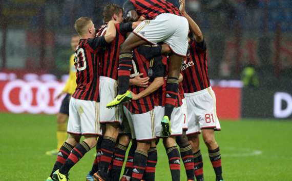 Milan celebrate with goalscorer Kaka