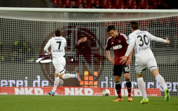 Vladimir Darida Makoto Hasebe Nuernberg v Freiburg - Bundesliga 11022013
