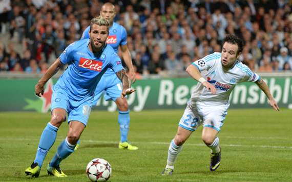 Napoli and Marseille players battle