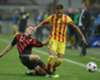 Barcelona and Milan players battle