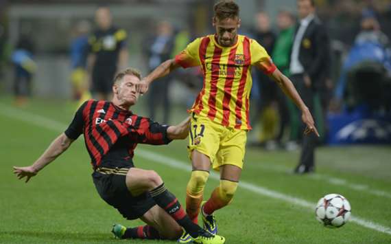 Barcelona and Milan players battle