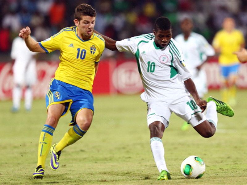 Kelechi Iheanacho (R) of Nigeria is challenged by Erdal Rakip of Sweden during the FIFA U-17 World Cup UAE 2013 Semi Final match at Al Rashid Stadium on Nov 5