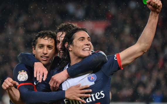 PSG players celebrate a goal against Lorient