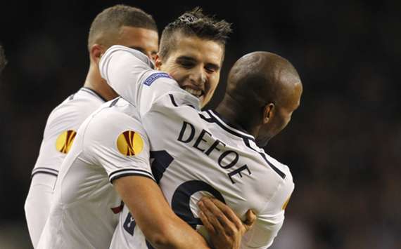 Tottenham players Erik Lamela and Jermain Defoe celebrate a goal against Sherif