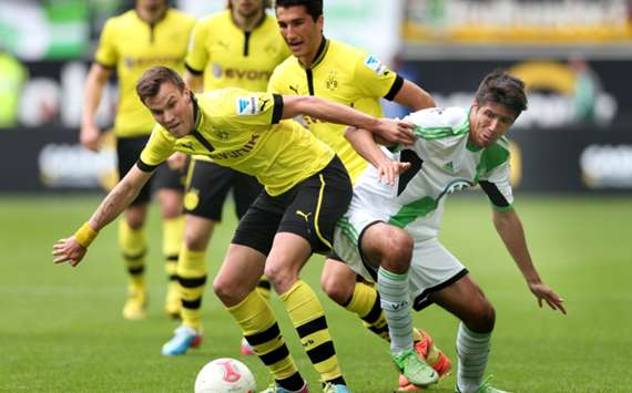 Borussia Dortmund fullback Kevin Grosskreutz and Wolfsburg midfielder Slobodan Medojevic