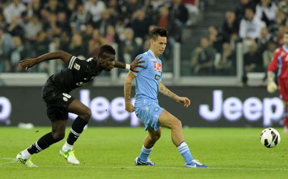 Napoli's Marek Hamsik fends off Juventus' Paul Pogba