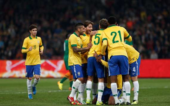 Brazil players celebrate a goal