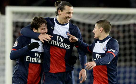 Zlatan Ibrahimovic (C) alongside Paris Saint-Germain's team-mates Maxwell and Marco Verratti