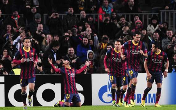 Barcelona players celebrate a goal