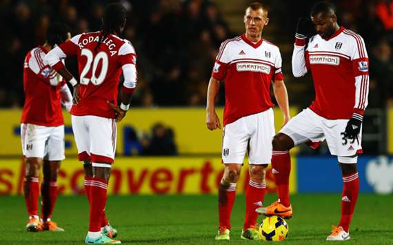 Fulham players react during their game with Hull City
