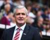 Hughes credits Stoke players as top-half target moves closer