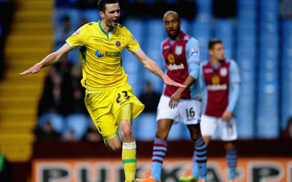 Murphy celebrates his goal at Villa Park