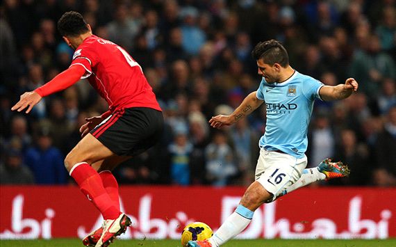 Sergio Aguero; Steven Caulker Manchester City v Cardiff City - English Premier League 01182014