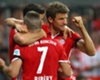 Thomas Muller celebrates with Franck Ribery and Robert Lewandowski