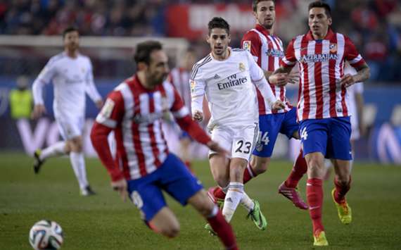 Atletico and Real Madrid battle
