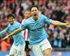 From Man City's cup conquest to a fiery Madrid derby — the defining images of the weekend