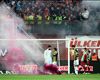 Trabzonspor-Fenerbahce clash abandoned amid fan violence