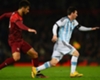 Portugal's Andre Gomes vies with Lionel Messi of Argentina