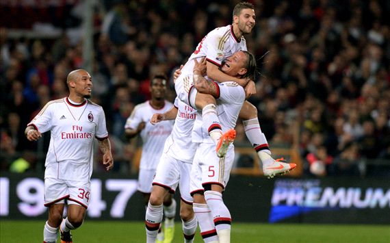 Adel Taarabt celebrates with teammates Genoa Milan Serie A