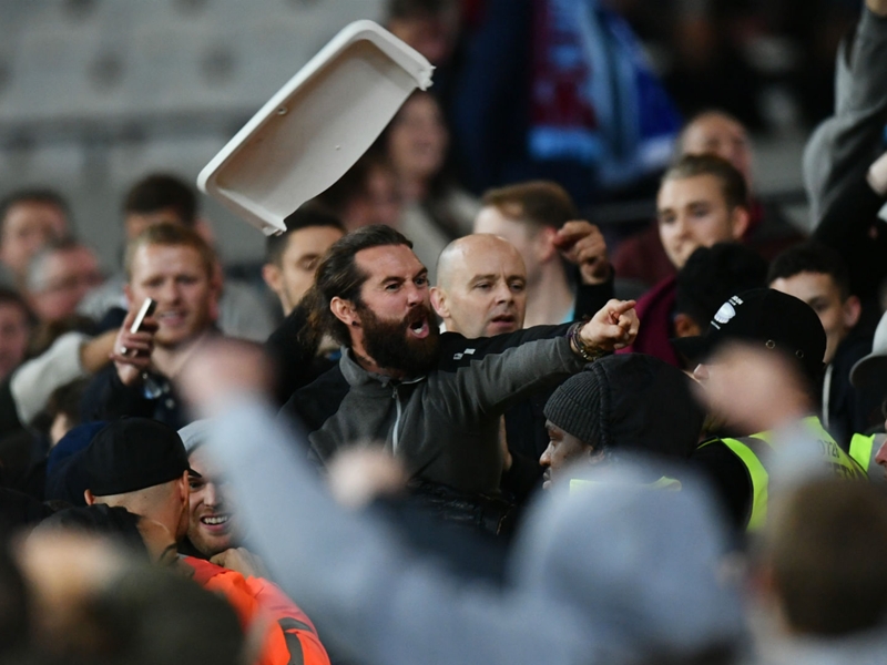 Seats torn apart & thrown as fan violence mars West Ham vs Chelsea clash