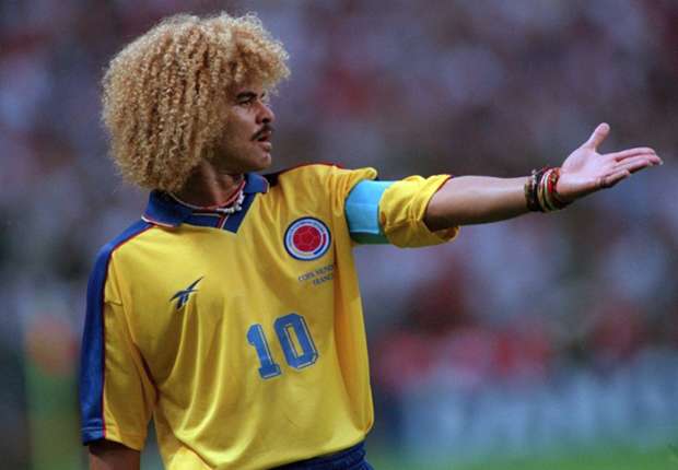 Why do Colombia fans wear sombreros and yellow wigs?