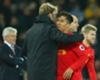 Liverpool manager Jurgen Klopp and Roberto Firmino