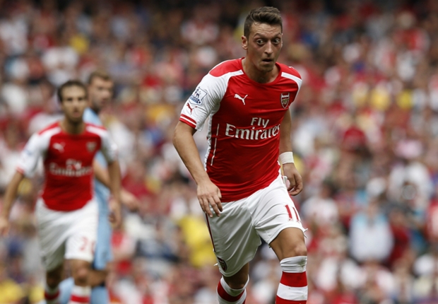 Wenger can make me a better player at Arsenal, insists Ozil