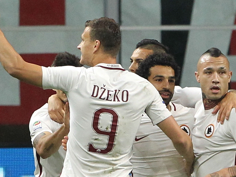 AC Milan 1 Roma 4: Dzeko's double keeps Serie A title race alive