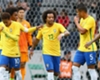 Brazil players celebrate Marcelo's goal against Japan