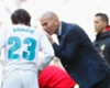 Real Madrid coach Zinedine Zidane talks to Mateo Kovacic