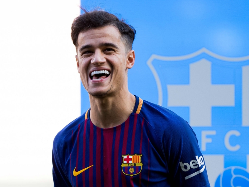 Messi and Pique welcome Coutinho to first Barcelona training session