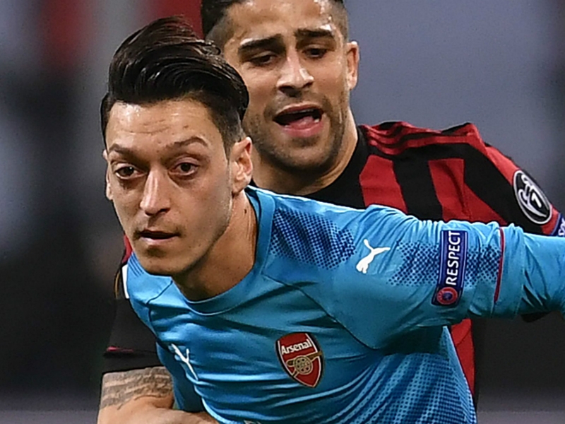 Magnificent Mesut steps up to keep Wenger and Arsenal's season alive