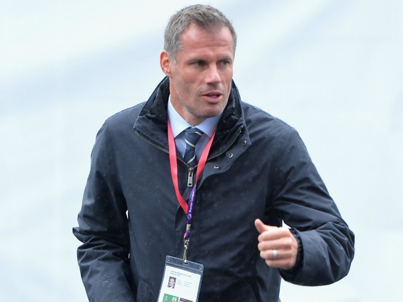 Liverpool great Carragher apologises for spitting at Man United fan