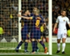Barcelona players celebrate a goal against Roma