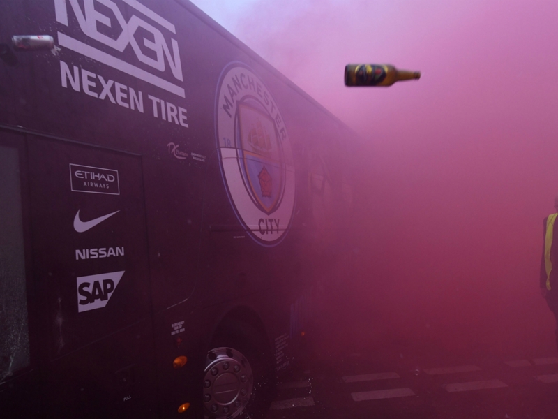 Guardiola questions police after Man City bus attacked by Liverpool fans