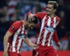 Antoine Griezmann and Koke celebrate a goal for Atletico Madrid.