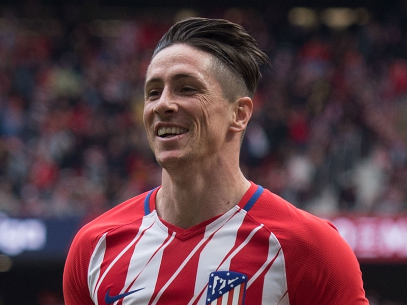 Simeone hails 'icon' Torres after landmark 100th goal