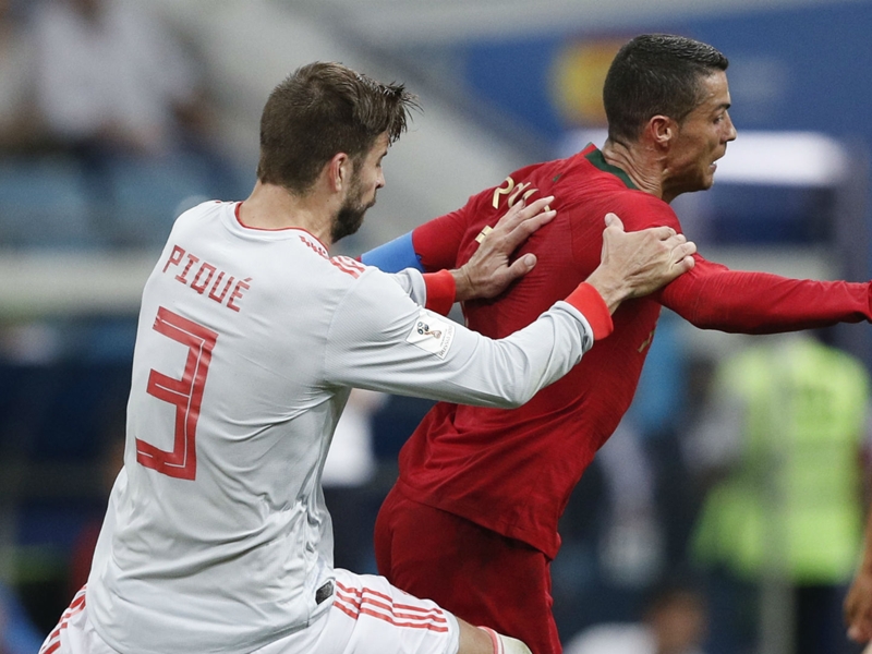Cristiano is prone to diving - Pique slams Portugal star