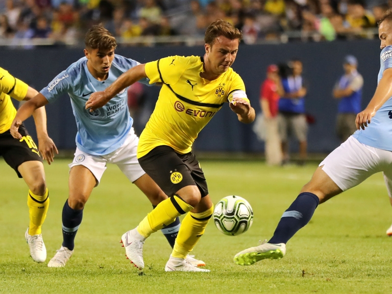 Gotze leads Dortmund to ICC win over Man City