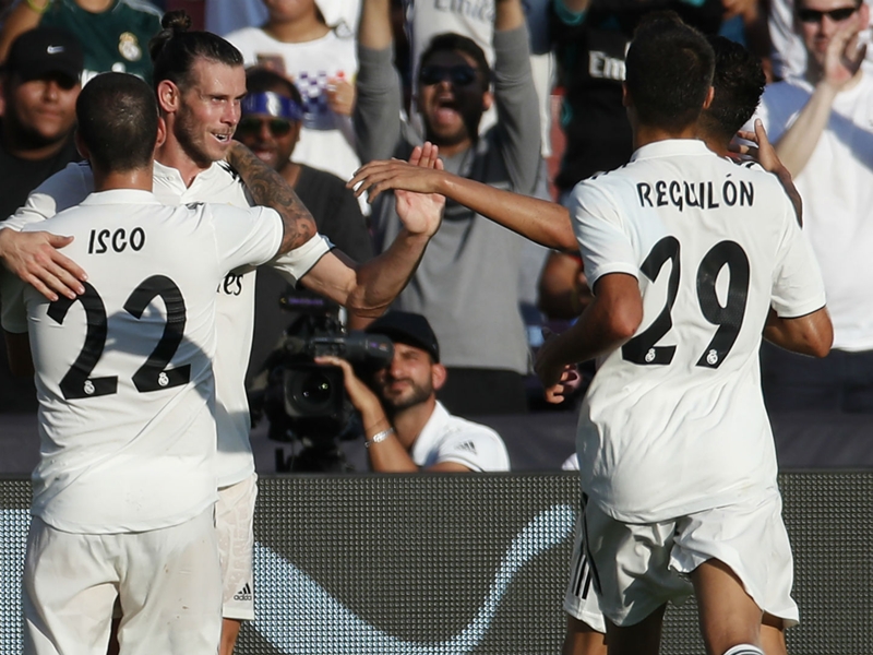 Asensio hits twice as Madrid top Juve