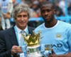 Manuel Pellegrini and Yaya Toure together at Manchester City.