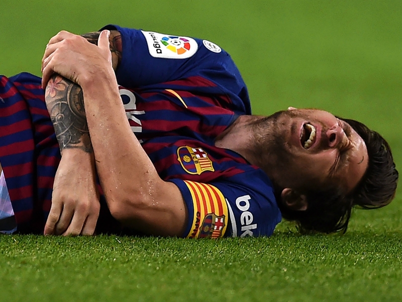Barcelona 4 Sevilla 2: Messi injured but champions go top
