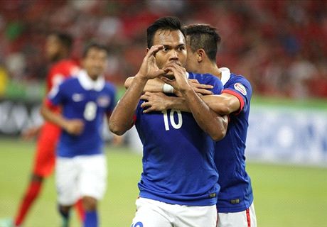 Late drama breaks Singapore hearts and sends Malaysia through