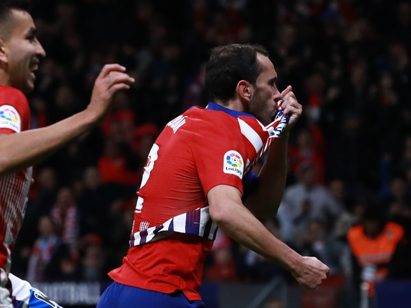 Atletico Madrid 2 Real Sociedad 0: Godin and Filipe Luis send Simeone's men top