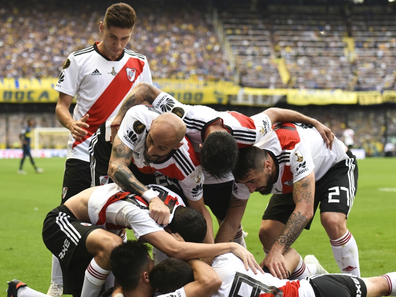 Boca Juniors 2 River Plate 2: Izquierdoz own goal ensures first leg ends level