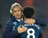 Felipe Anderson celebrates with Manuel Pellegrini