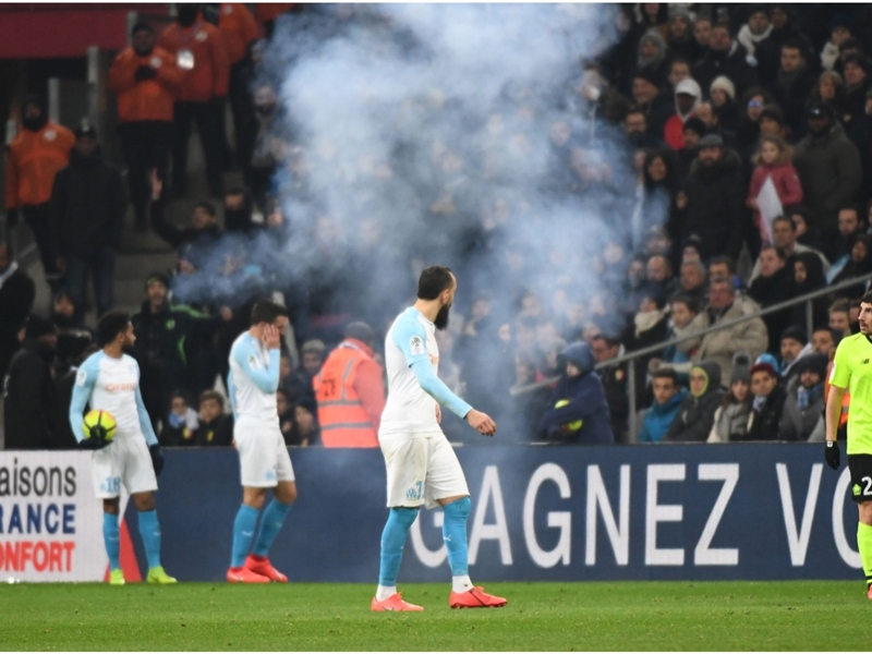 Lille win at Marseille after 38-minute delay following firecracker thrown on field