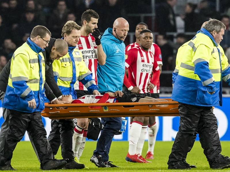 PSV's Lozano taken off injured after two-goal haul