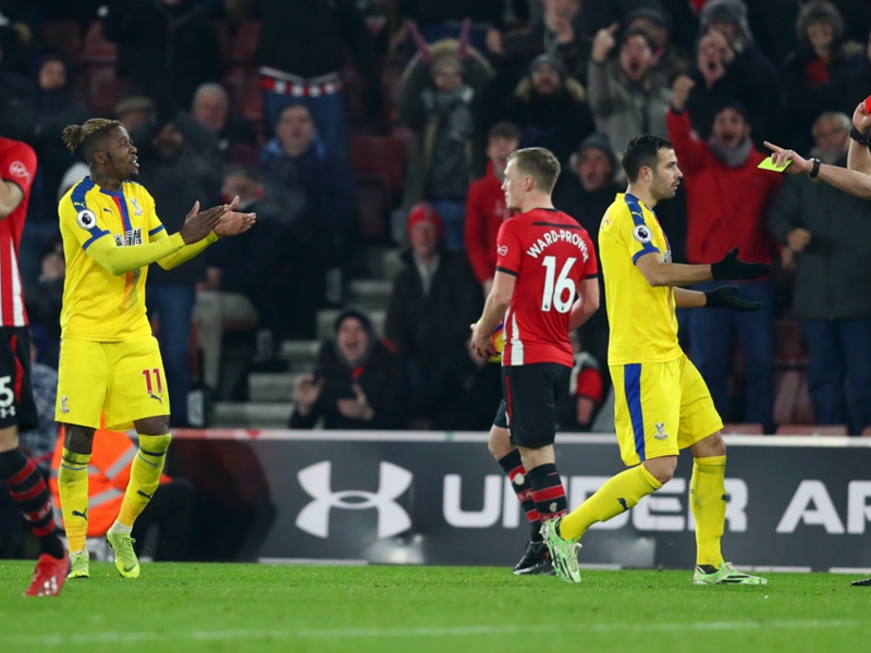 Zaha apologises after applause leads to red card